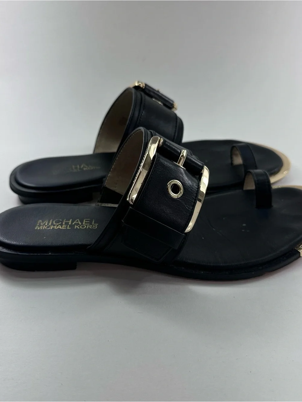 MICHAEL Michael Kors Black Leather Buckle Toe-Ring Slides with Gold Trim